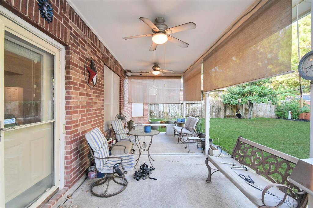 large covered patio with gas hookup for generator & BBQ grill