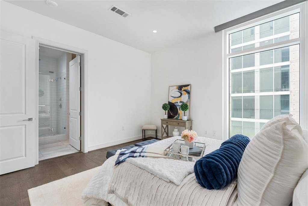 This primary suite has a great amount of space for your personal items.