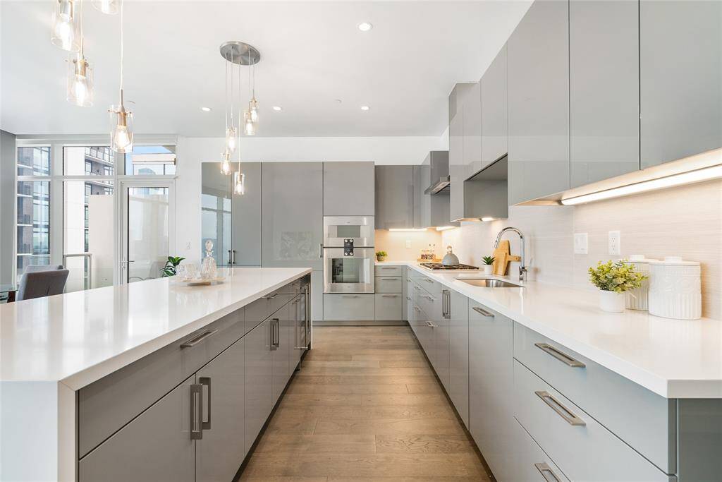 Prepare gourmet meals in luxury with an abundance of cabinetry, high-end appliances and extensive counter space!