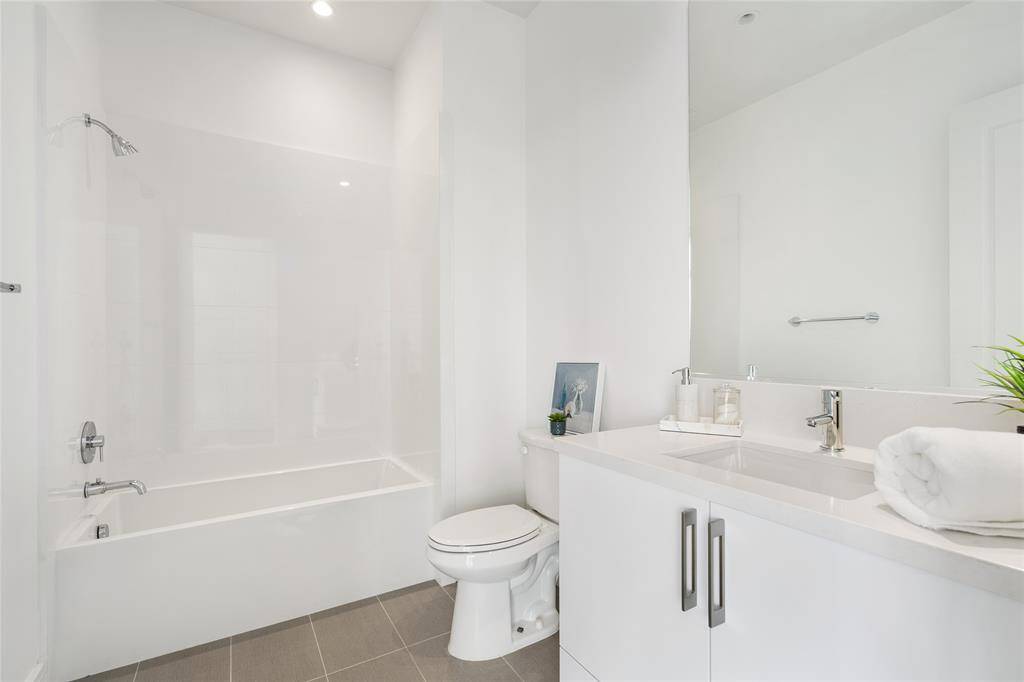 Simple and elegant, this second bathroom is conveniently located inside the second bedroom.