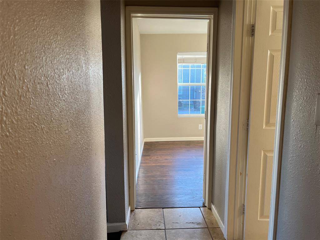 View of one of the bedrooms from the hallway.
