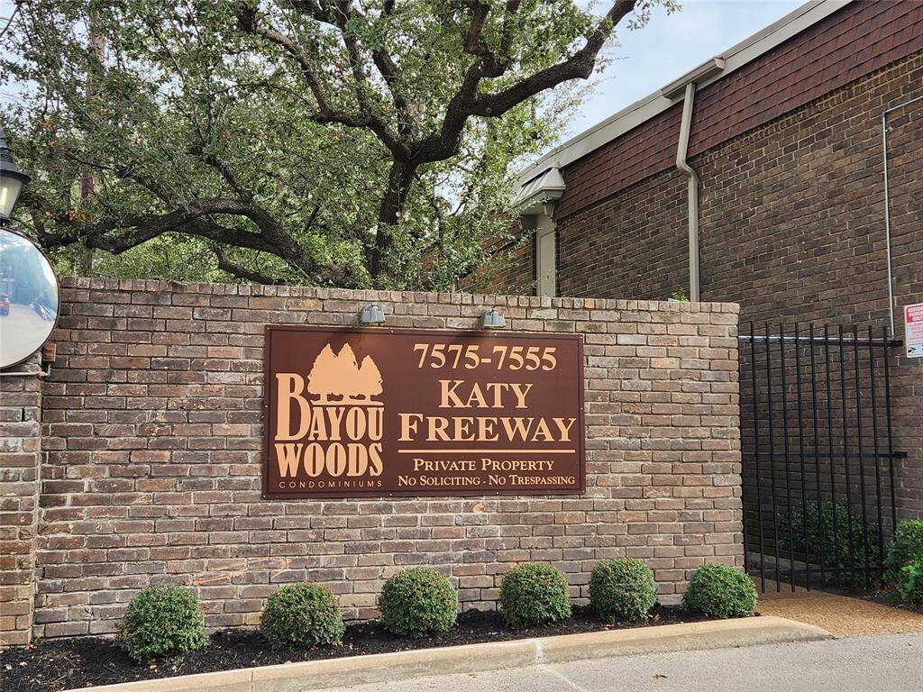 East on Katy Freeway Access Rd between Hotel & Church