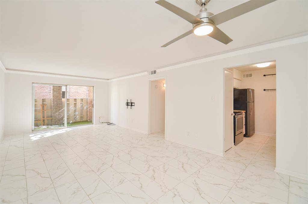 Crown Molding & Ceramic Tile Floors with Gray Veining