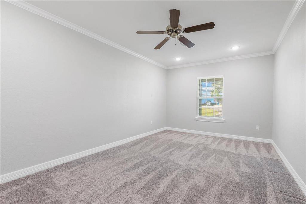 garage has been converted into a large bedroom with closet