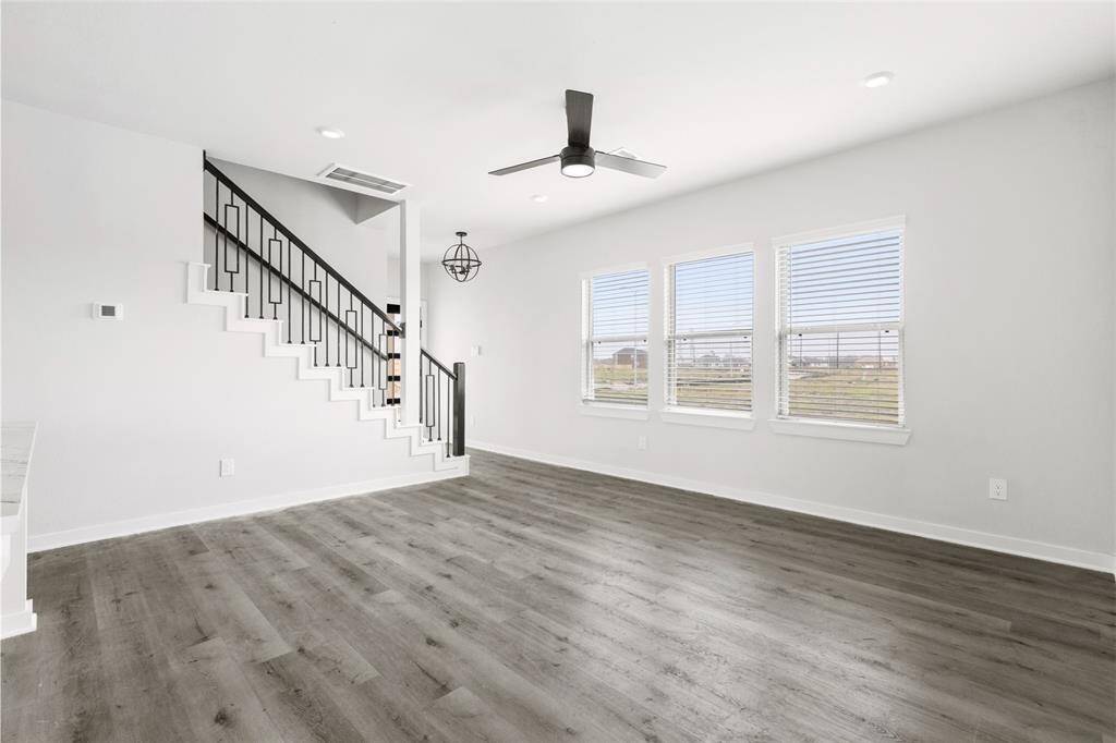 Family room with lots of lighting.