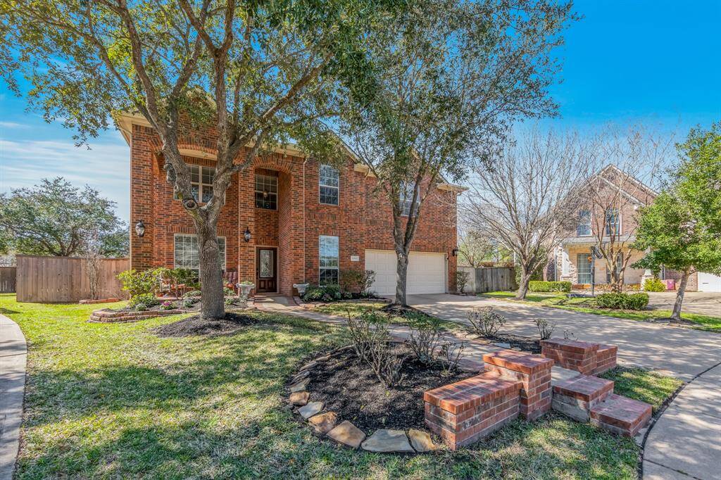 The home features a charming, bricked front porch that adds curb appeal and provides a welcoming space to relax or greet guests. Its durable design complements the exterior, offering both style and functionality.