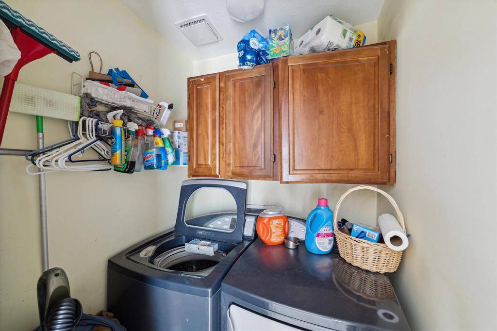 Utility room located inside the home. Washer and dryer convey with the property.