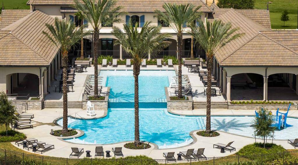 The gorgeous pool offers separate areas for adults and children, plus a sun-drenched courtyard offering lake views from shaded patios featuring flat-screen televisions