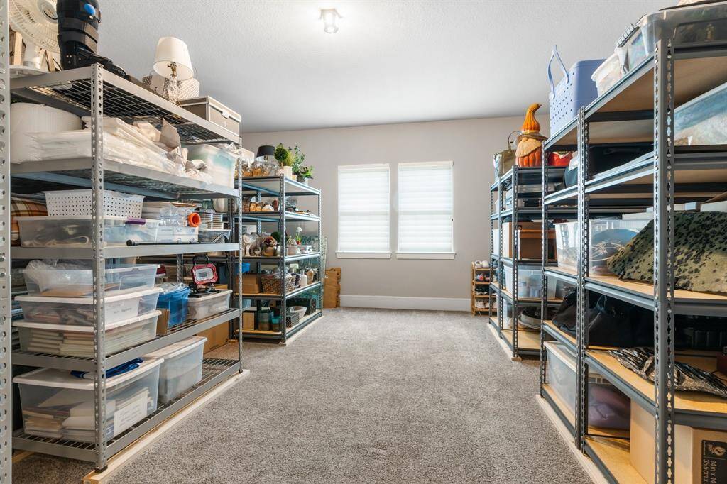 Endless Storage! Endless possibilities! This expansive, climate-controlled space offers limitless possibilities for organization and functionality. Home gym, craft room, media etc.