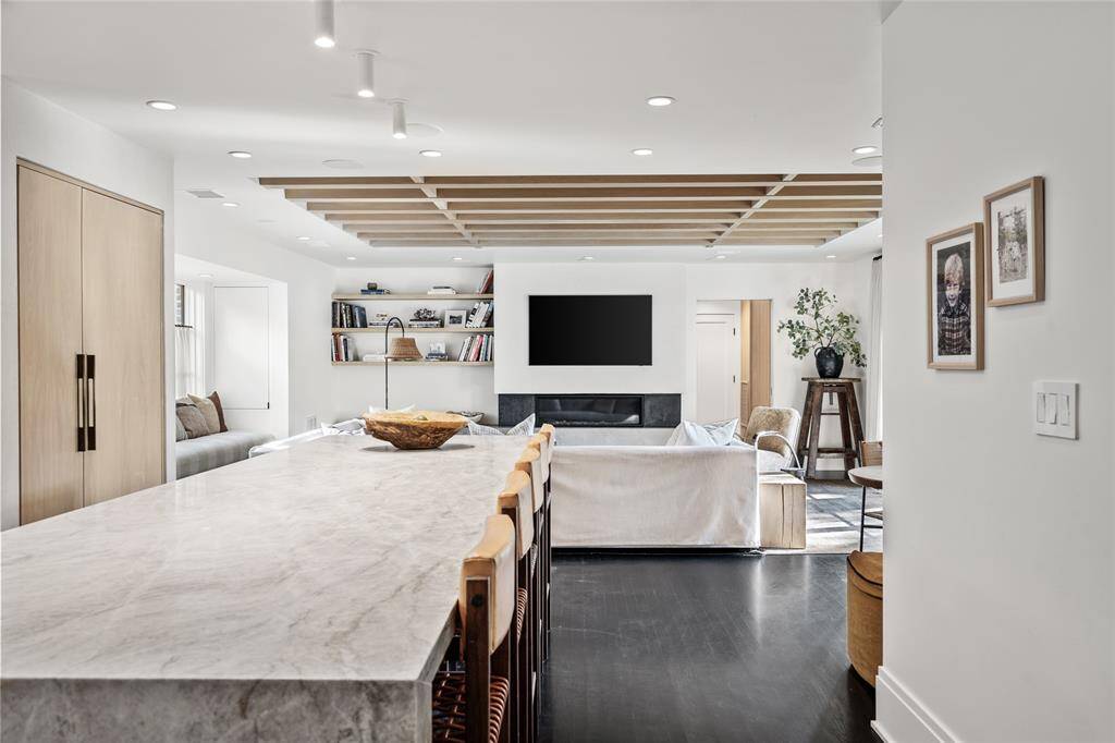 Another view of the kitchen showing the expansive island
