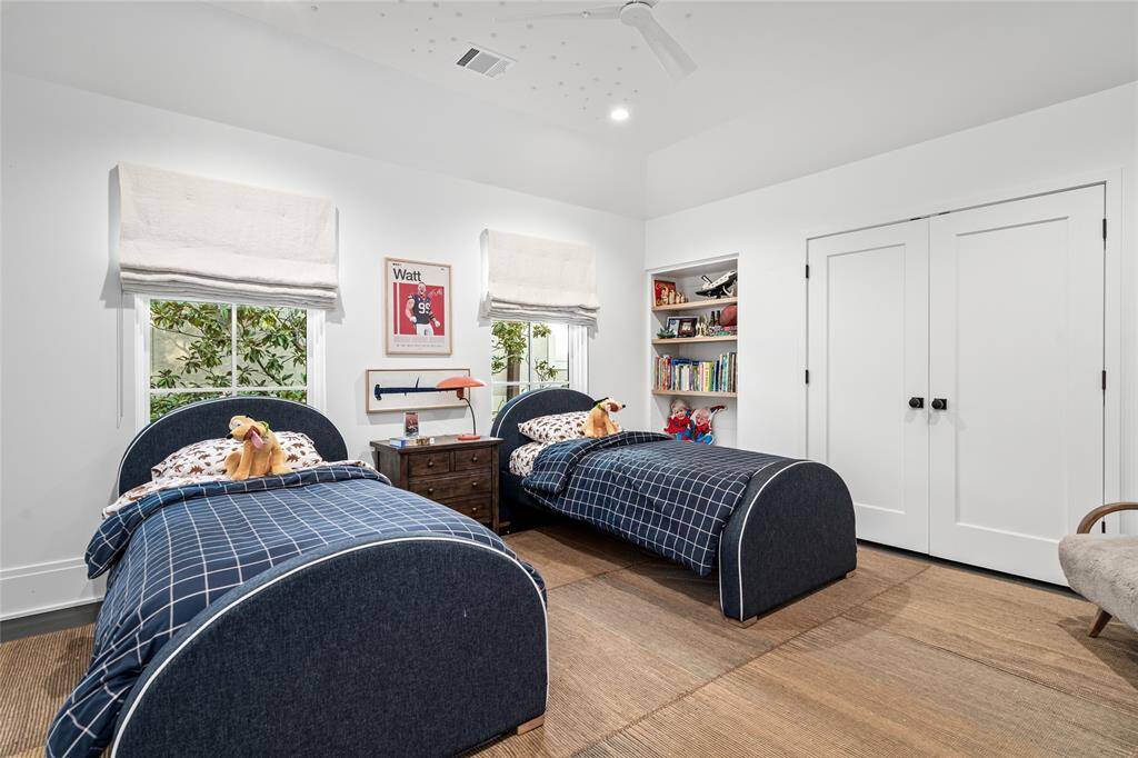 Middle secondary bedroom with bookshelf nook