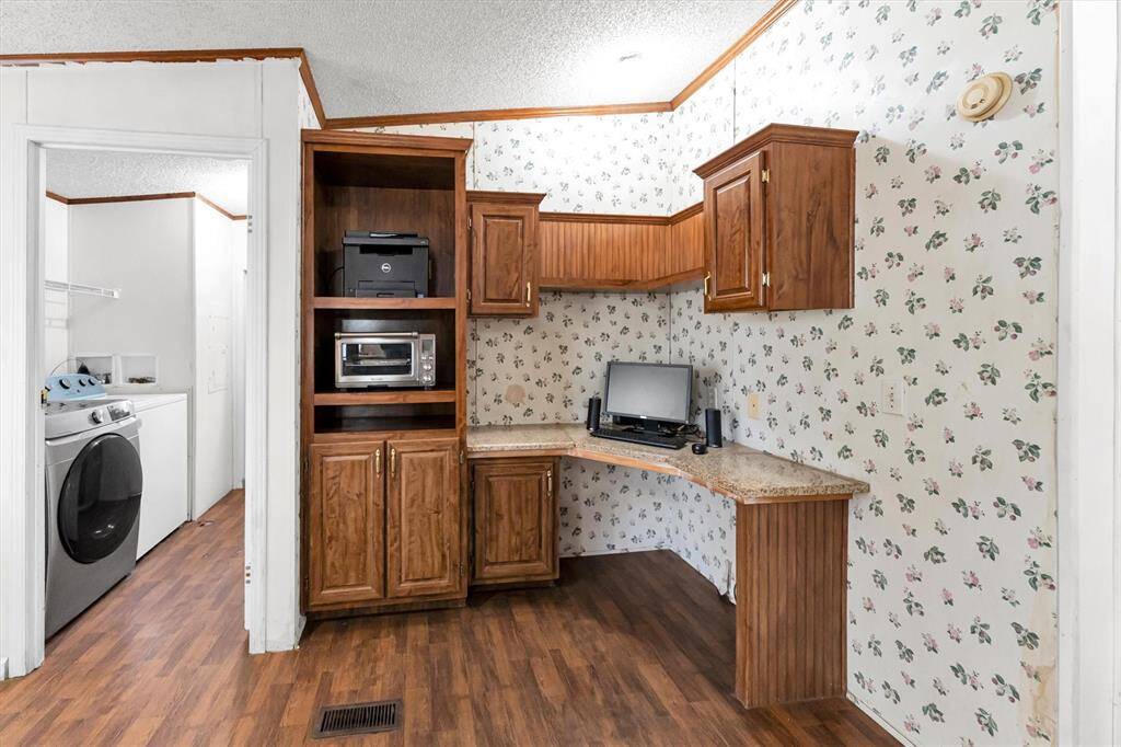 Full size office area with plenty of room for storage, printer, books and supplies
