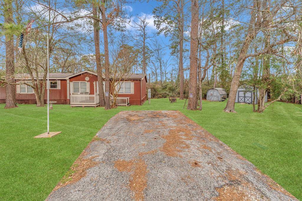 Driveway and view from Road - (visual of yard after sodding, if desired)