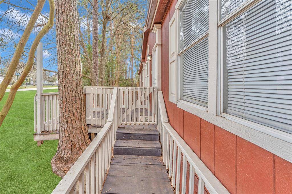 Entry walkway with hand rails.