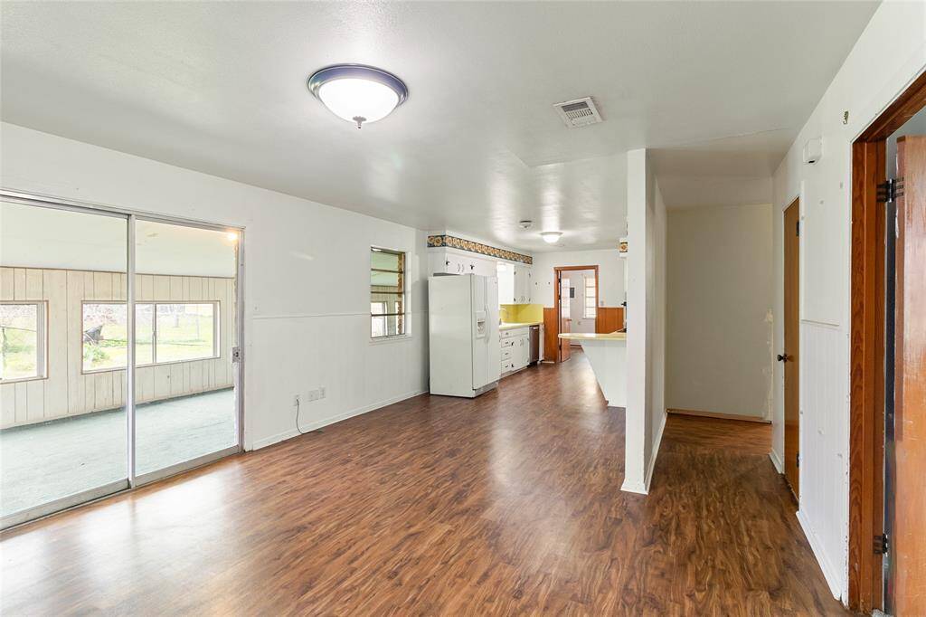 Dining area open to kitchen and enclosed patio area