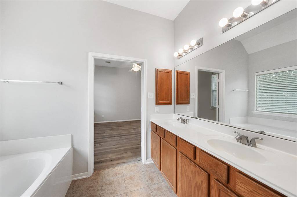 With plenty of counter space, this bathroom offers a functional, comfortable layout that makes everyday routines easy.