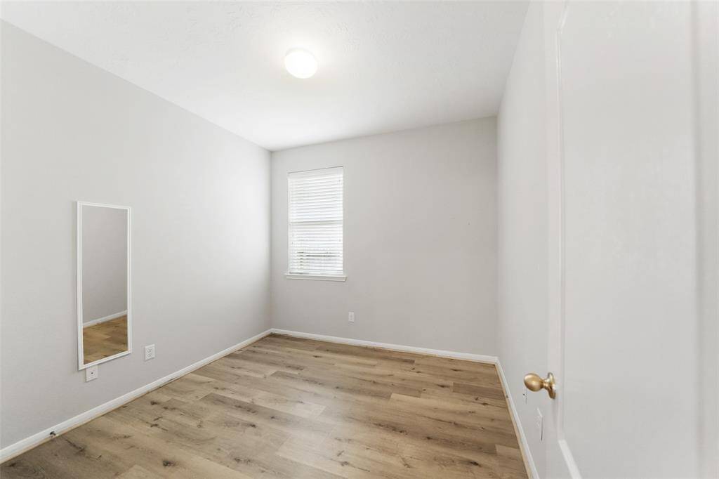 The secondary bedrooms are spacious and feature no carpet, offering easy maintenance and plenty of room for your family’s needs or guests.