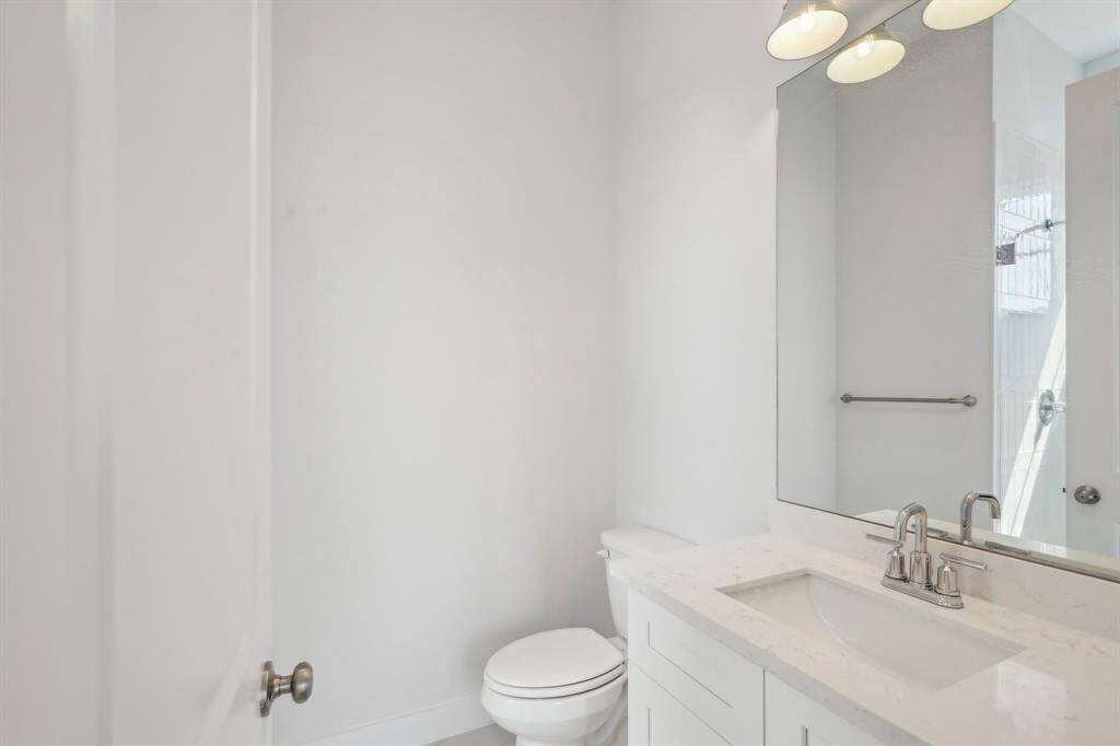 Your en-suite with a quartz vanity.