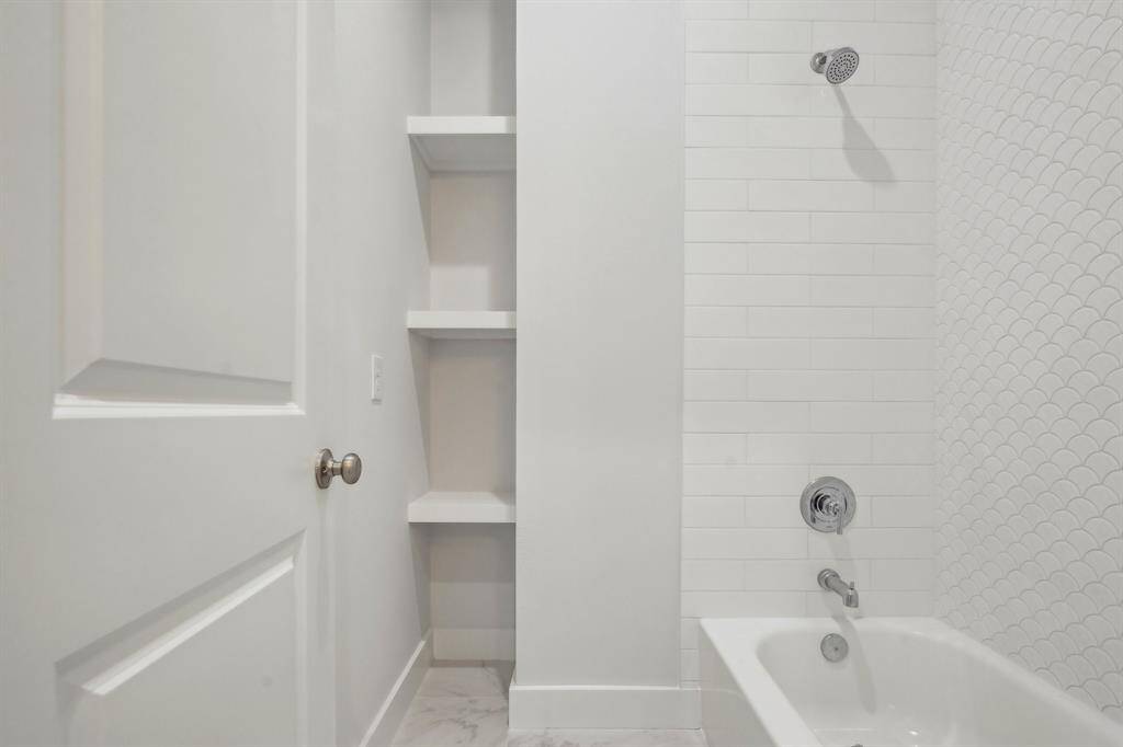 The hollywood bath offers a tub shower combination, and additional storage.