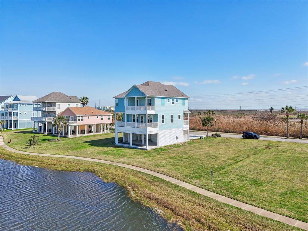 Backing up to the lake, you will enjoy the soothing sounds of the fountains.