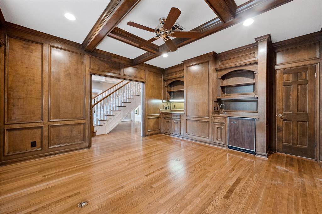 Another view of the Study off the foyer... Built in shelving and cabinetry... Space for a small refrigerator..