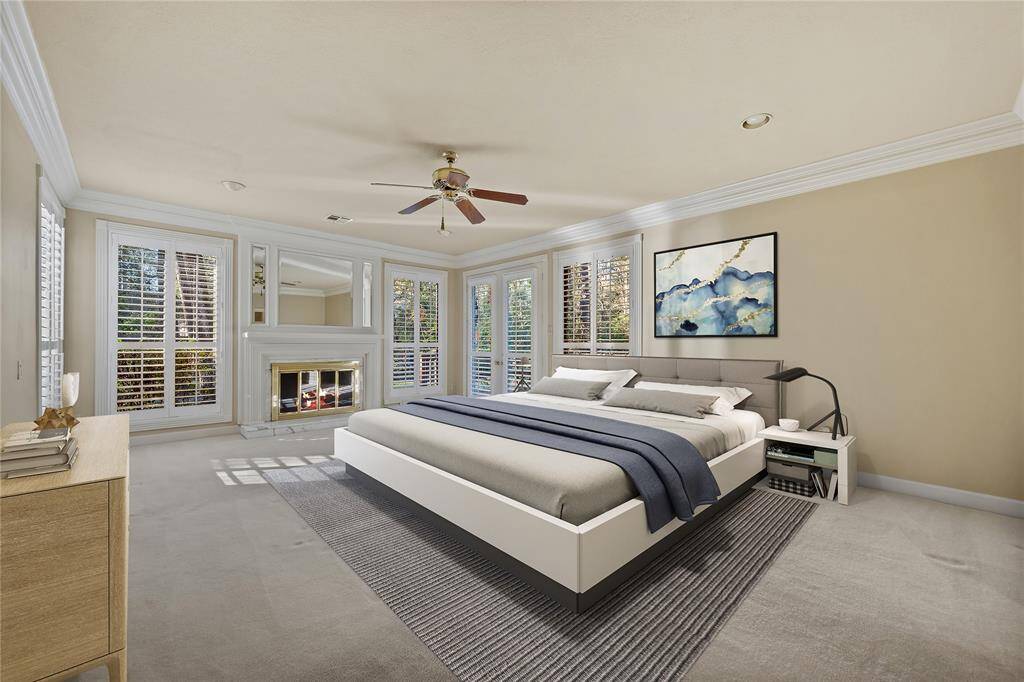 Primary Bedroom suite is down... Plantation shutters... (of course!)