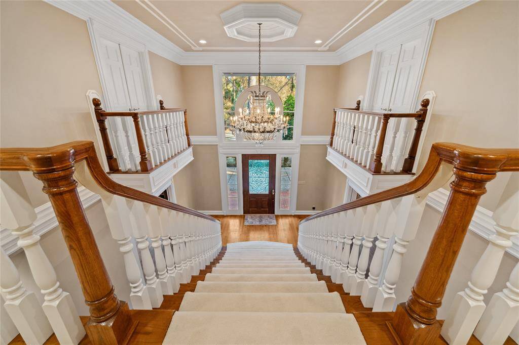 And a view from the top of the staircase. "Check out the Crown molding"!! Juliette areas open to the Foyer!