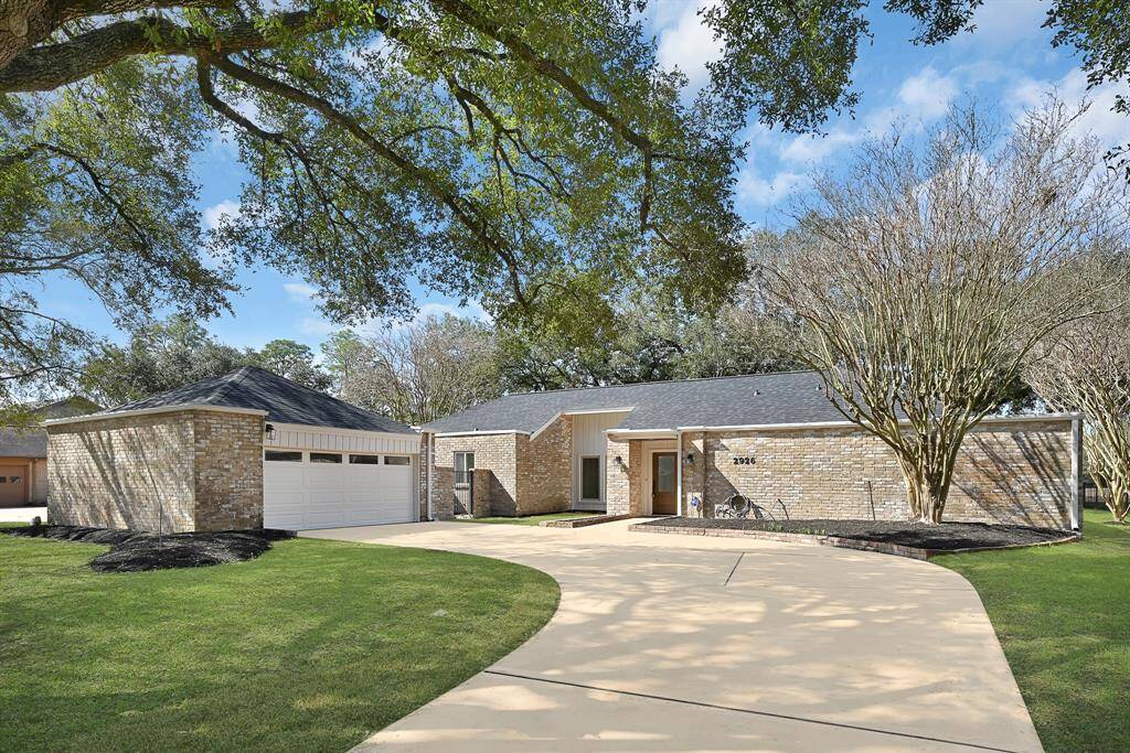 This beautifully redesigned one-story brick home features a brand-new entrance door and updated entry ceiling, creating a stylish and inviting curb appeal. The newly mulched front landscape area awaits your imagination to design a stunning outdoor aesthetic that complements the home's charm.This beautifully redesigned one-story brick home features a brand-new entrance door and updated entry ceiling, creating a stylish and inviting curb appeal. The newly mulched front landscape area awaits your