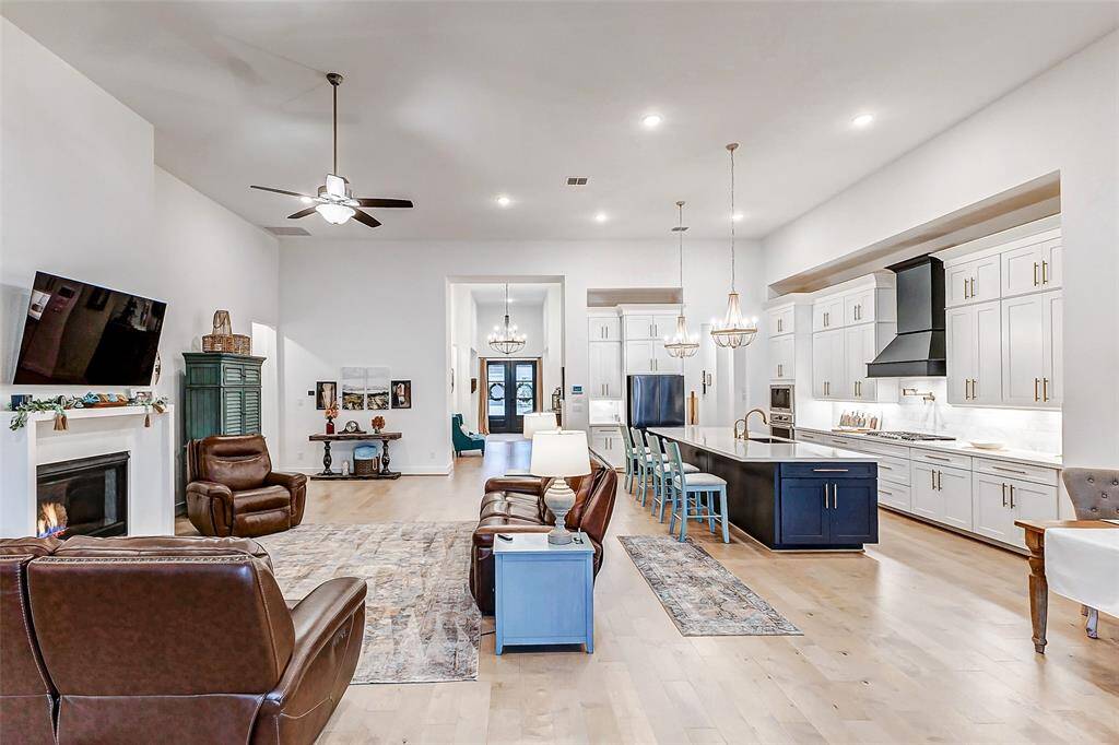 Expansive & Inviting – The family room boasts soaring 14-ft ceilings, creating a grand yet cozy atmosphere for everyday living.