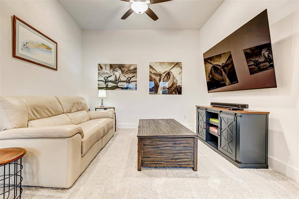 Enjoy movie nights in this theater-style room with dimmable lighting.