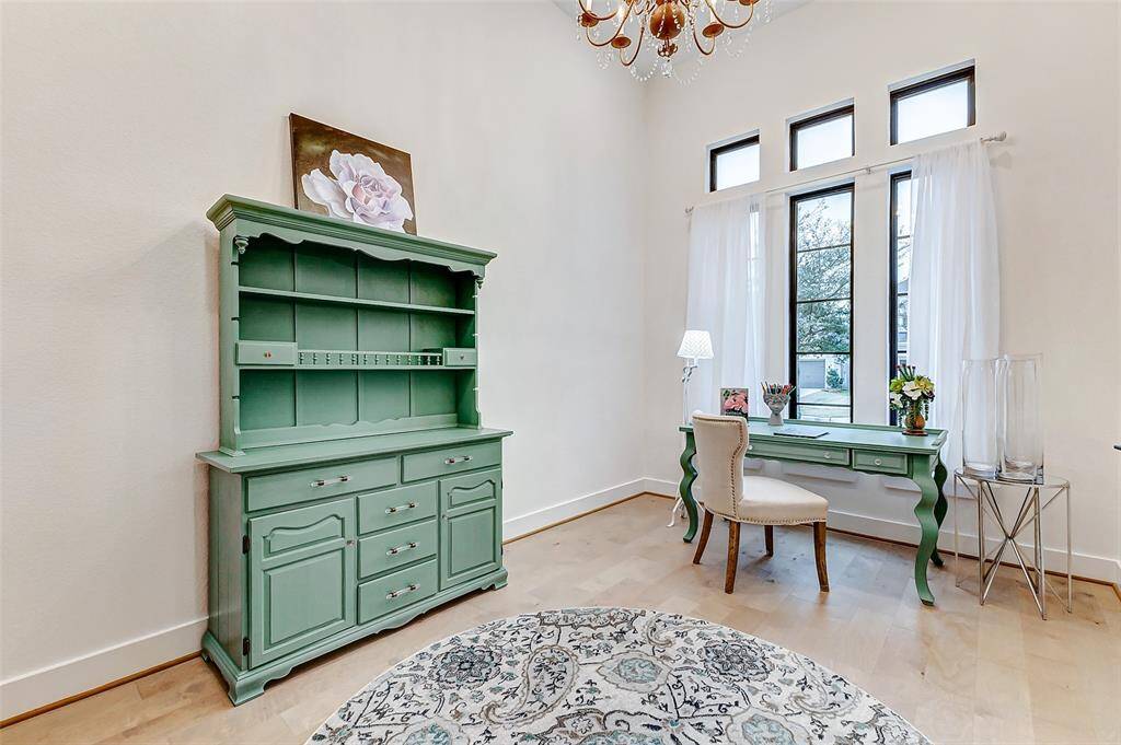 Large windows provide plenty of natural light, creating an inspiring and productive environment. escape to a quiet, separate space ideal for remote work or creative projects.