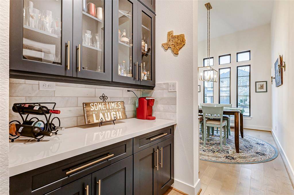 Convenient Butler’s Pantry Access – Located adjacent to the butler’s pantry, making meal prep and serving effortless.
