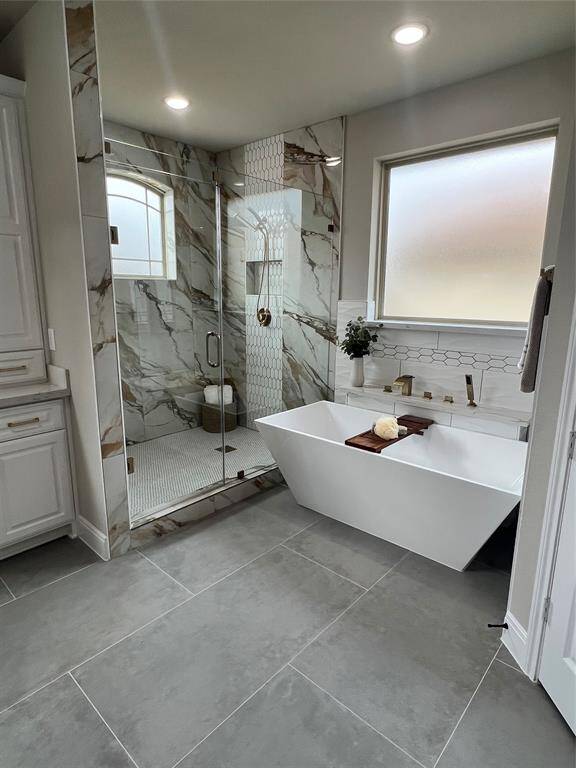 Other Interior Pictures of a Similar Master Bathroom with Separate Shower Built by Tx Best Home Builders.