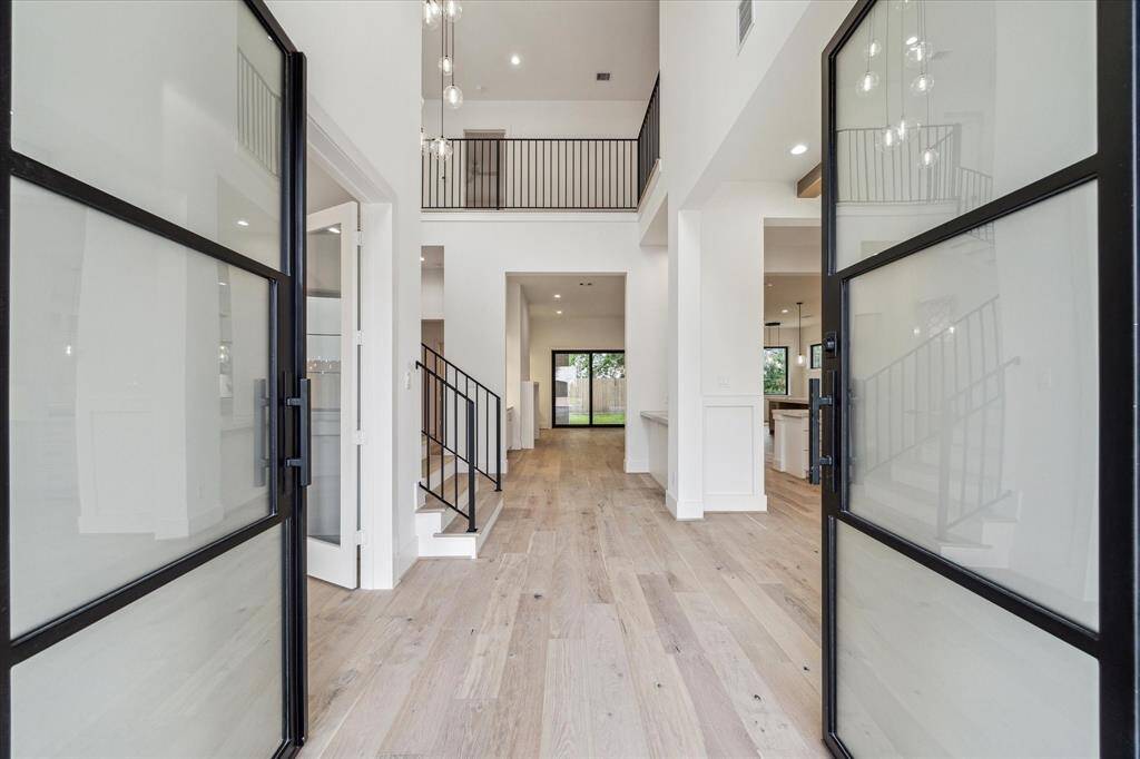 Open the front door to a world of luxurious, designer appointments and top-of-the-line finishes, fixtures and appliances. Floors throughout are low maintenance, stain and scratch resistant, 7.5" French Oak Engineered Wood / Monza Favale.