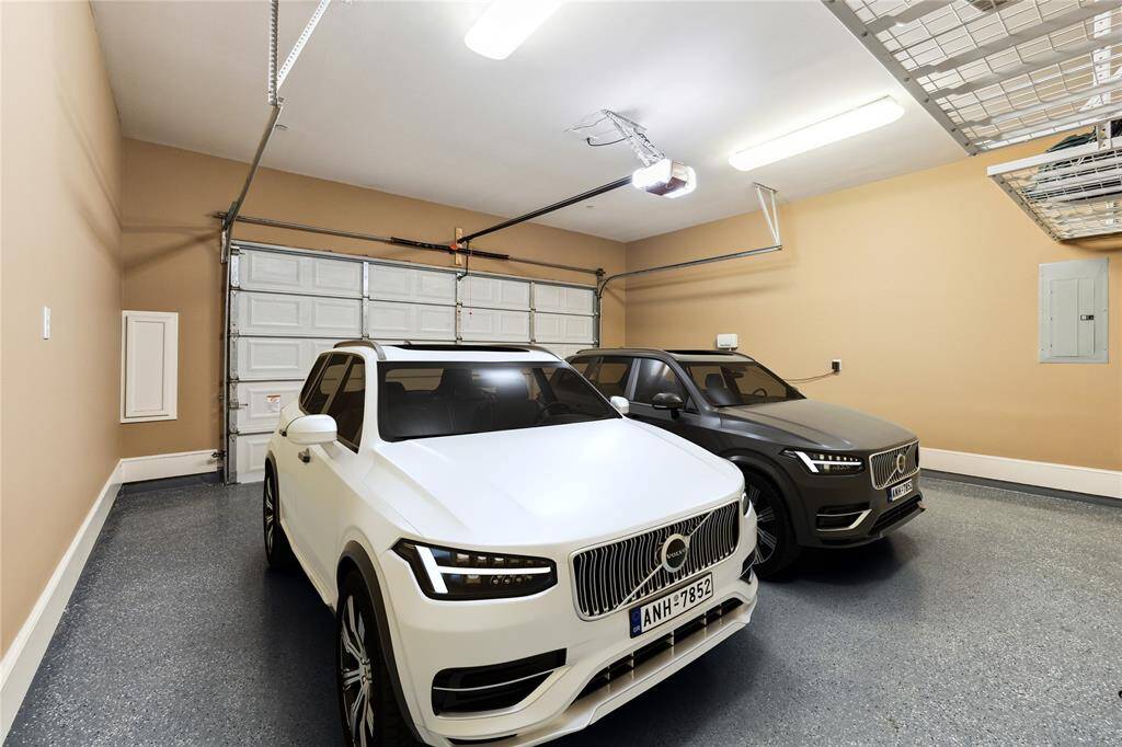 Virtually staged with two crossover SUV's.