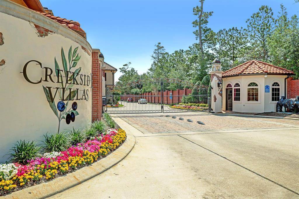 A true gem tucked away in gated Creekside Villas of Memorial!