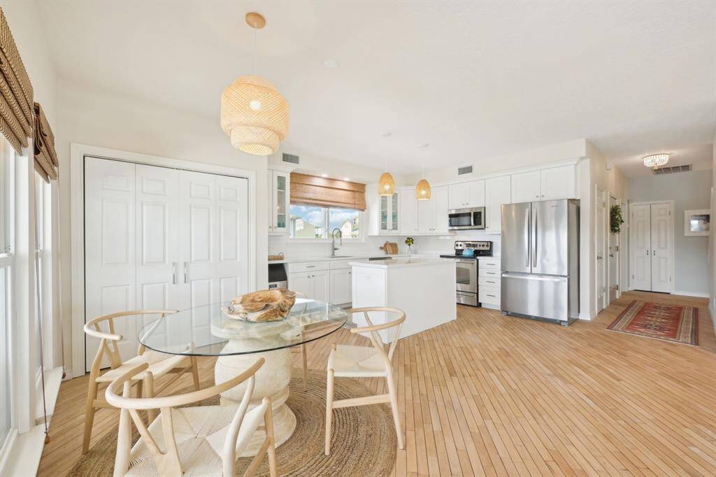 The oaks floors compliment the kitchen and natural light beautifully!