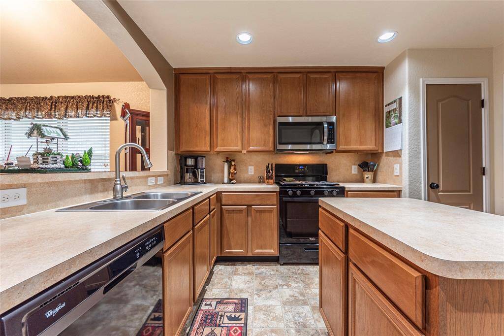 Kitchen includes a dishwasher.