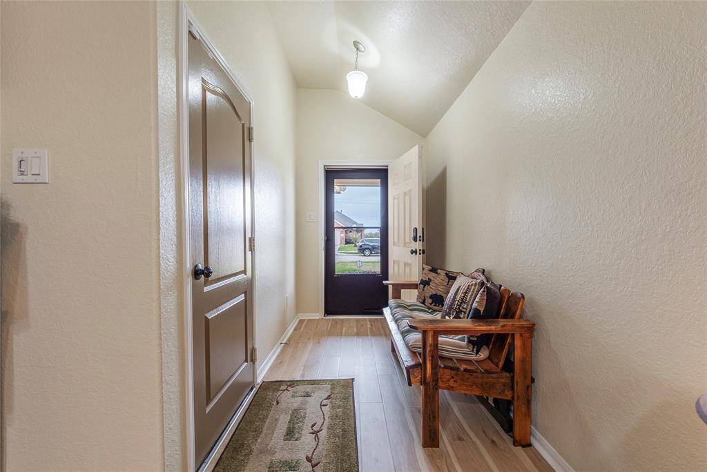 There is a storm door to leave closed and let light in on a sunny day!
