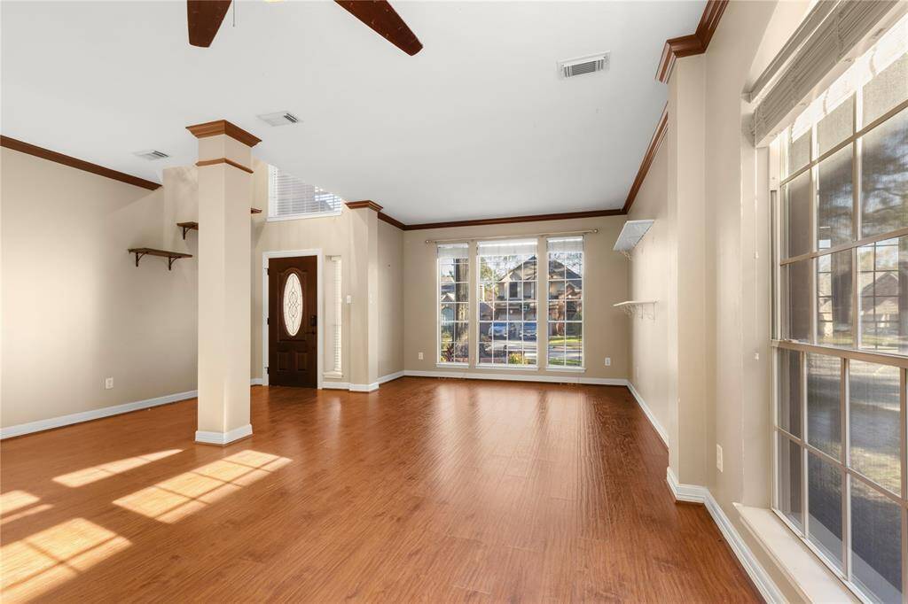 A traditional open foyer and formal spaces  are the best first impression.