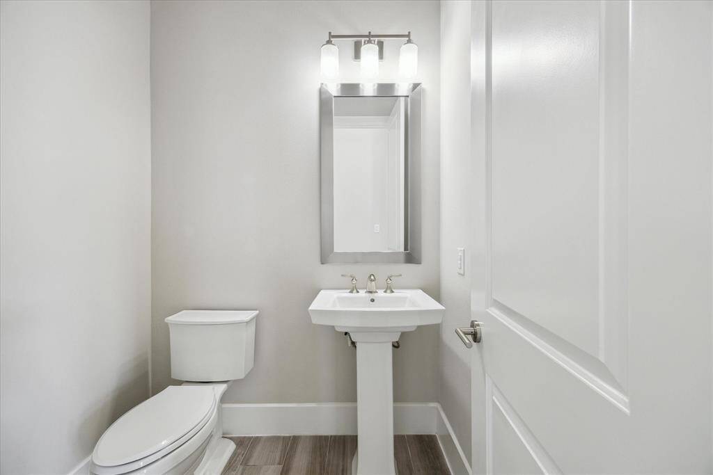 Power bath discreetly tucked off the main living/dining area.