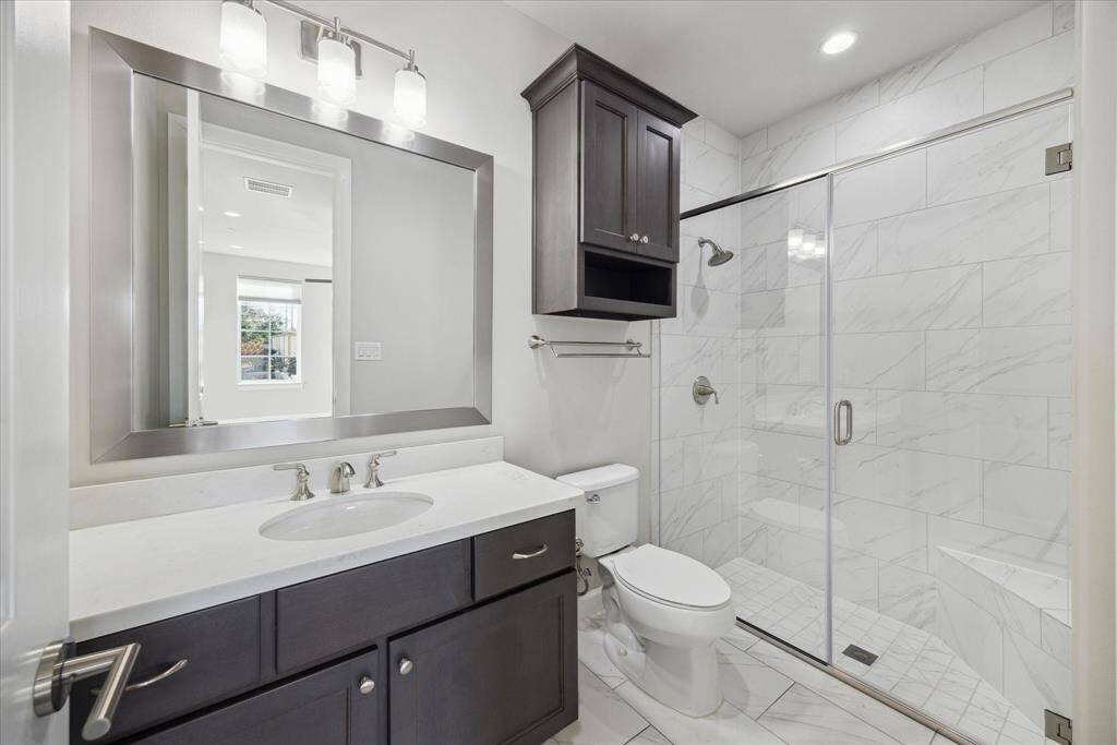 First floor bathroom with today's finishes.  Walk in shower and floor to ceiling tile.