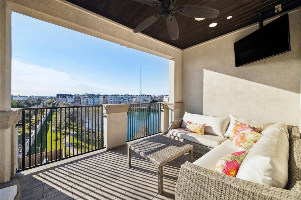 This spacious balcony expands the primary suite.  In-ceiling speakers.