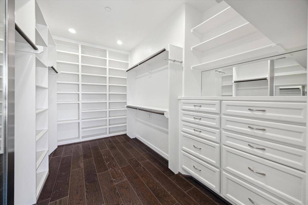 Huge walk-in closets with his and her space.  Drawers, shoe shelves, open shelving - everything you need!