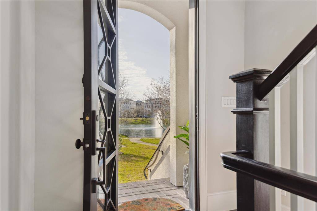 Magical describes the experience of intown living in a prime, waterfront location. This pristine home rivals new construction.