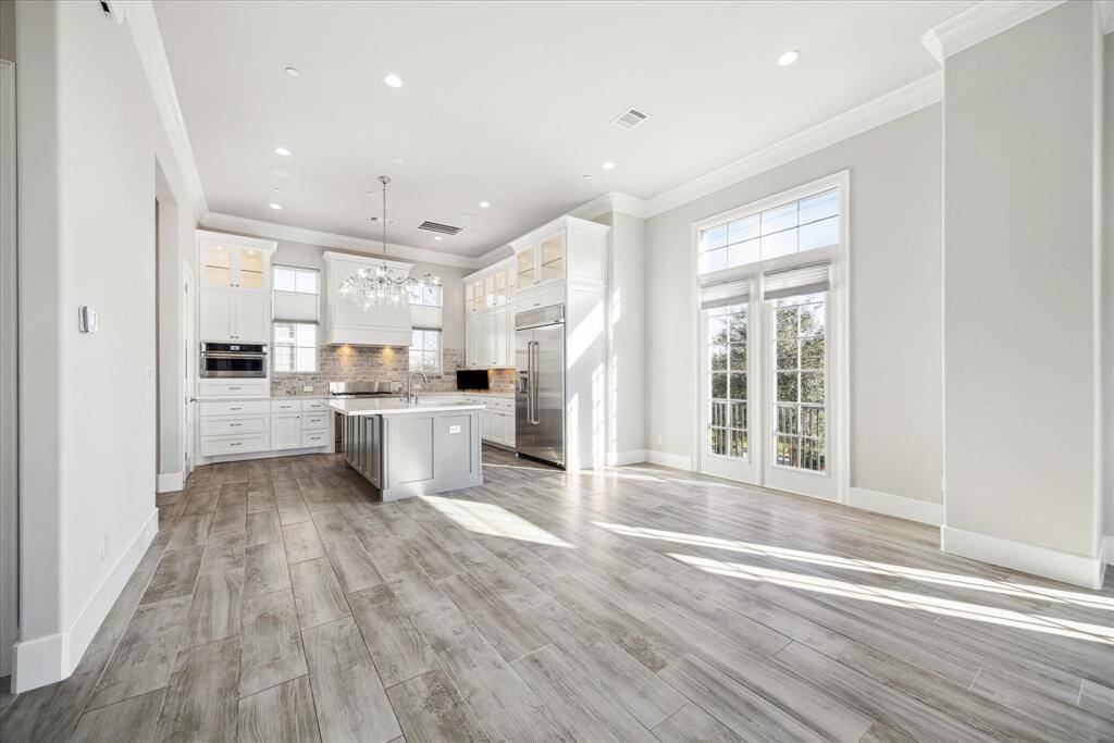 Walls of windows flood the space with natural light.  The end location provides ultimate privacy, as well.