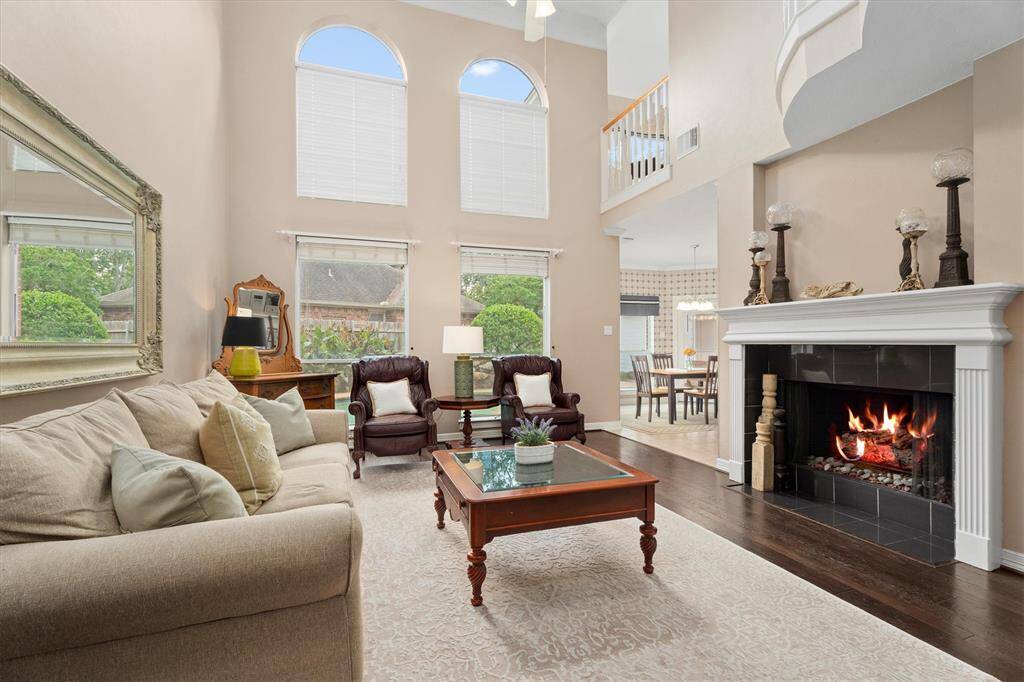 Step from the inviting living area into the sunlit breakfast nook, perfect for morning meals and casual dining.