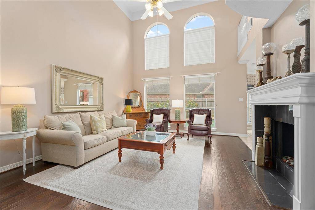 Large ceiling to floor windows bring in so much light. This beauty sits on a cul-de-sac lot and has it's own swimming pool/hot tub.
