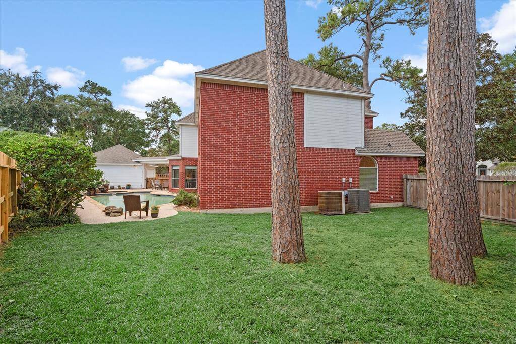 Explore the expansive backyard oasis, perfect for your dream garden or a delightful children's play area.