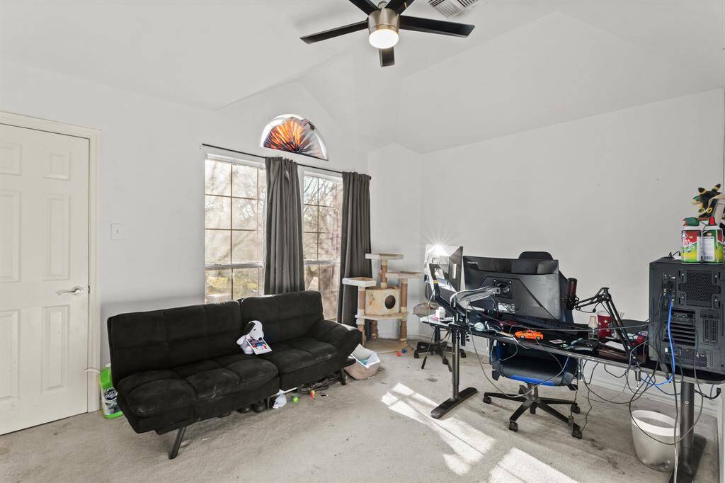 One of 4 upstairs bedrooms being used as an office.
